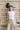Sleeveless Top With Ruched Hem
