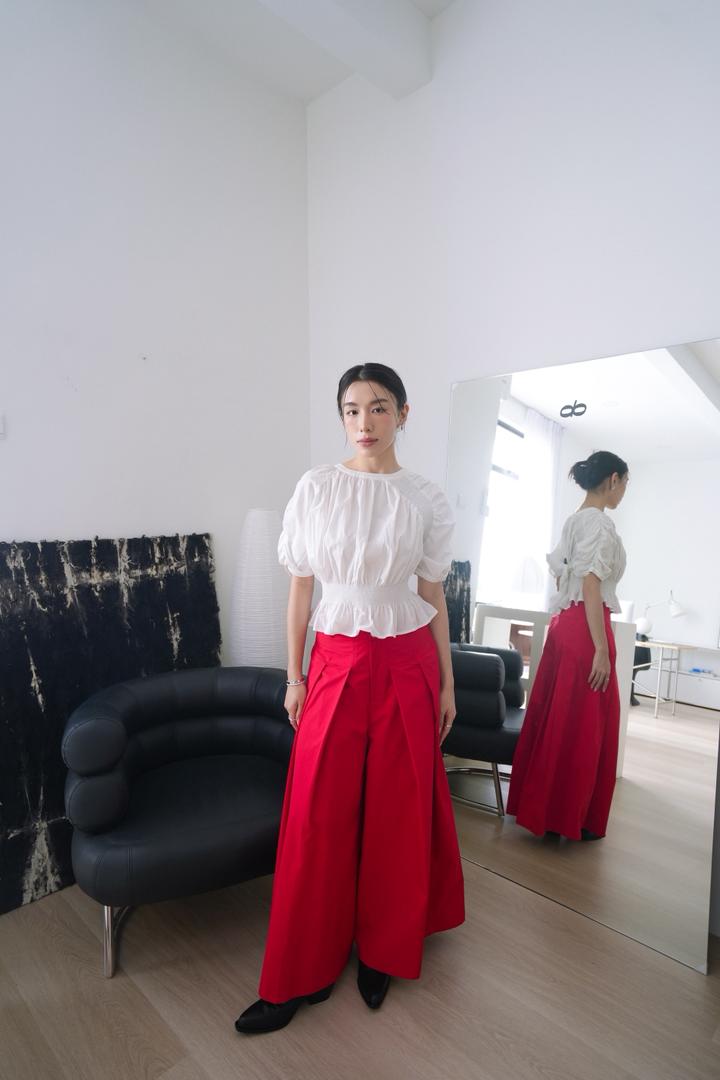 Peplum Top With An Elastic Waist