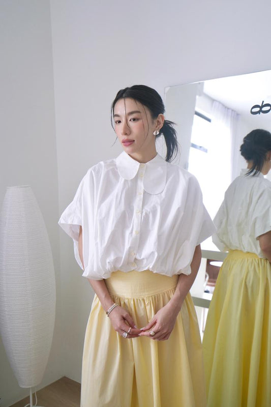 Round asymmetrical neckline shirt