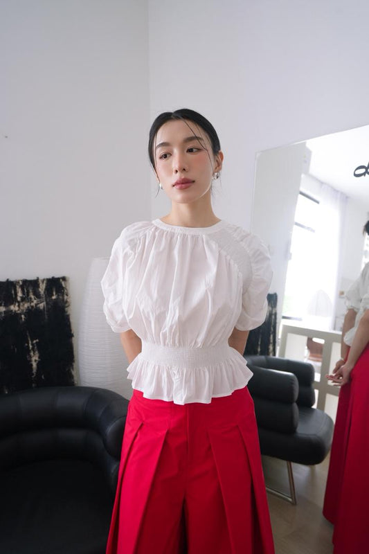 Peplum Top With An Elastic Waist