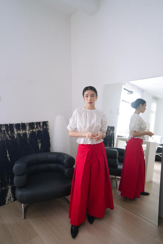 Peplum Top With An Elastic Waist