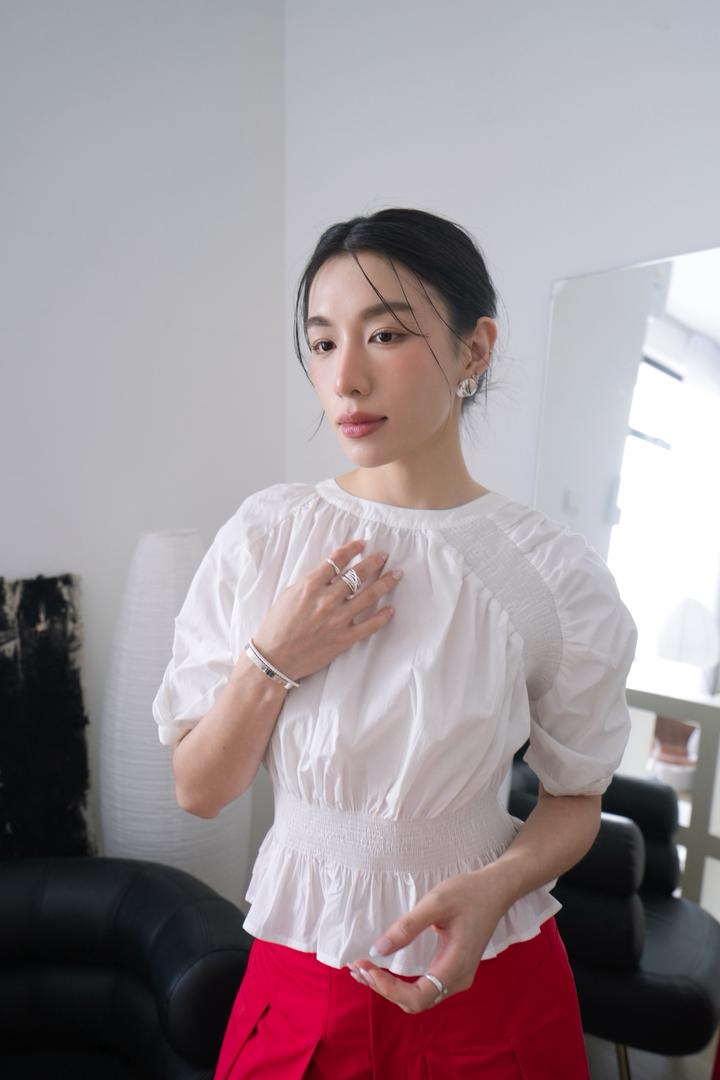 Peplum Top With An Elastic Waist